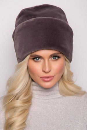 Шапка Элегантная женская шапка мягкой формы из искусственного меха.