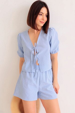 Костюм в клетку голубой