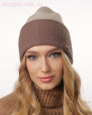 Колпак Бренд: Odyssey     Тип изделия: Колпак
Отворот: шапка с отворотом
Состав: 50% ангора 15% вискоза 10% шерсть 25% ПА
Подклад: двойной