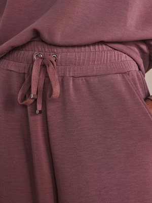 Джоггеры из смеси модала с розовыми манжетами