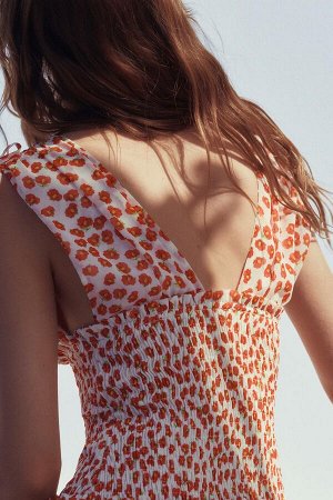 платье ЦВЕТ как на первом фото КОРОТКОЕ ПЛАТЬЕ С ПРИНТОМ (KURZES KLEID MIT PRINT) Короткое платье с глубоким V-образным вырезом и регулируемыми широкими бретелями с бантом. Эластичная ткань с сотовой 