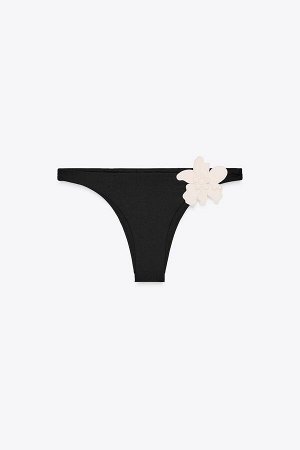 купальник ЦВЕТ как на первом фото БРЮКИ БИКИНИ С ЦВЕТКОМ (BIKINIHOSE MIT BLUME) Плавки бикини с эластичным поясом средней высоты. Нанесение контрастного цветка. внутренняя подкладка. СОСТАВ МАТЕРИАЛА,