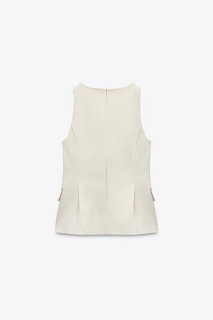 топ ЦВЕТ как на первом фото ТОП С БАСКОЙ И ВОРОТНИКОМ-ЛАЦКОЙ (PEPLUM-TOP MIT REVERSKRAGEN) Топ с V-образным вырезом и безрукавками. Воротник-лацкан спереди. Внутренняя подкладка из комбинированного ма