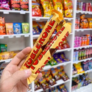 Toblerone 50g - Швейцарский шоколад Тоблерон с медовыми ирисками и миндалем
