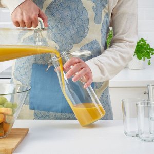 КОРКЕН Банка в форме бутылки с крышкой, прозрачное стекло, 1,4 л