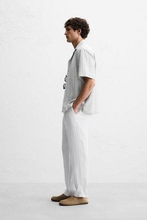 Брюки ЦВЕТ как на первом фото БРЮКИ ИЗ ЧИСТОГО ЛЬНА (HOSE AUS REINEM LEINEN) Брюки прямого кроя из льняной ткани. Талия с декоративной складкой спереди. Передние карманы и деталь с прорезными карманам