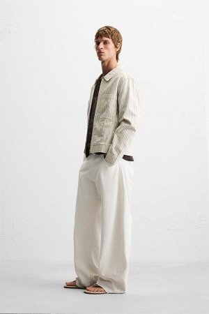 Жакет ЦВЕТ как на первом фото ПОЛОСАТАЯ РУБАШКА С КАРМАНАМИ (GESTREIFTES OVERSHIRT MIT TASCHEN) Верхняя рубашка свободного кроя из хлопчатобумажной ткани. Воротник-лацкан и длинные рукава. Накладные к
