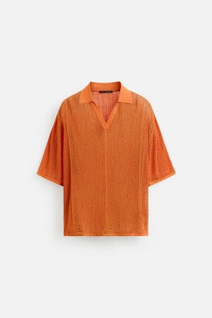 Трикотаж ЦВЕТ как на первом фото Ажурная трикотажная рубашка-поло (POLOSHIRT AUS STRICK MIT AJOURMUSTER) Рубашка-поло свободного кроя из ажурной ткани. Воротник-лацкан с разрезом спереди. Короткие рук