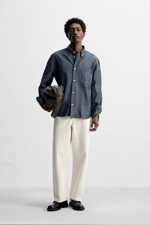 Рубашка ЦВЕТ как на первом фото РУБАШКА ИЗ ШАМБРЕ С ТЕКСТУРНЫМ УЗОРОМ (CHAMBRAY-HEMD MIT STRUKTURMUSTER) Рубашка прямого кроя из легкой хлопчатобумажной ткани. Воротник на пуговицах и длинные рукава с