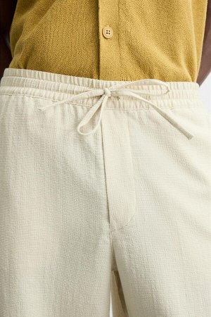 Брюки ЦВЕТ как на первом фото БРЮКИ ИЗ ЖАККАРДОВОЙ ТКАНЬЮ С УЗОРОМ (JACQUARD-HOSE MIT STRUKTUR) Брюки свободного кроя из смесовой хлопчатобумажной ткани. Эластичный пояс с регулируемой резинкой и шнур