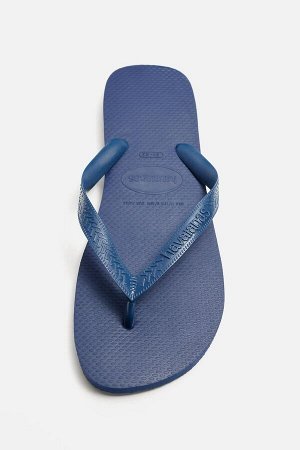 Шорты ЦВЕТ как на первом фото САНДАЛИИ HAVAIANAS ® x ZARA (HAVAIANAS ® x ZARA SANDALEN) Сандалии из однотонной резины. С двумя ремешками на подъеме для большего комфорта. Плоская подошва того же цвета