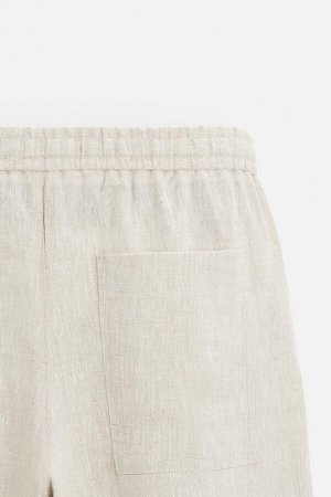Брюки ЦВЕТ как на первом фото БРЮКИ ИЗ ЧИСТОГО ЛЬНА (HOSE AUS REINEM LEINEN) Брюки свободного кроя из льняной ткани. Талия регулируется шнурком. Передние карманы и накладные задние карманы. СОСТАВ МАТ