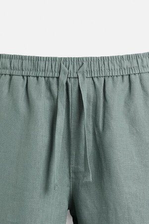 Брюки ЦВЕТ как на первом фото БРЮКИ СТАНДАРТНОГО КРОЯ ИЗ 100% ЛЬНА (REGULAR-FIT-HOSE AUS 100 % LEINEN) Брюки прямого кроя из льняной ткани. Эластичный пояс с завязкой. Декоративные складки спереди. Пе