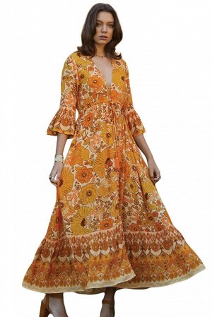 Приталенное макси платье с цветочным узором в желто-оранжевых тонах и воланами на рукавах