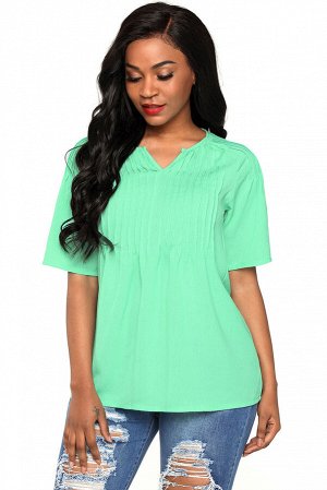 Светло-зеленая блуза со складочками и рукавами реглан
