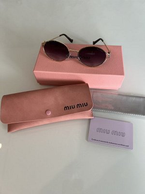 Солнцезащитные очки Miu Miu