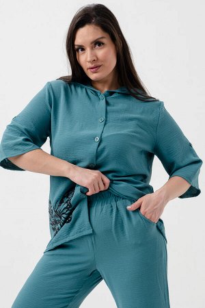Костюм Варианты расцветки: бирюзовый
Ткань:  сингапур, Состав:  100% полиэстер
Костюм СИНГАПУР- это стильный и удобный комплект, состоящий из блузки и штанов. Блузка с капюшоном оснащена пуговицами и 