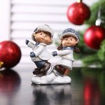 Сувенир полистоун &quot;Малыши в зимних нарядах на коньках&quot; 8,8х8,5х3,7 см