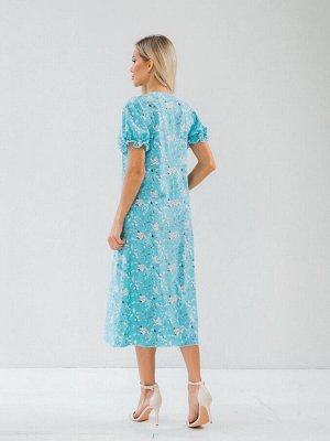 Платье Легкое и воздушное платье из легкой ткани Ниагара. Расцветка цветы на голубом.  V - образная горловина на внутренней обтачке. Короткий втачной рукав - фонарик 24 см. Низ прямой. Без подклада. П