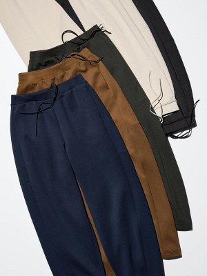 UNIQLO Dry Sweat Curve Pants - брюки из дышащей ткани с изогнутым силуэтом - 58 DARKGREEN