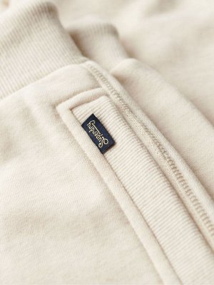 Кремовые спортивные брюки Superdry Essential с логотипом