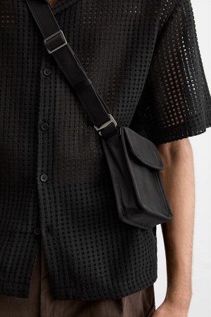 Сумка Нейлоновая сумка через плечо ЦВЕТ как на первом фото (UMH?NGETASCHE AUS NYLON) Сумка через плечо из функциональной ткани. Основное отделение с клапаном и застежкой на кнопку. Внутри плоский карм