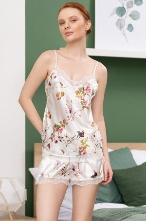 Vikki 4625 Комплект Mia-Amore состоит из топа и шорт, выполнен из принтованного смесового шёлка. Лиф топа и шорты по низу украшены тонким изящным кружевом
Состав 70% натуральный шёлк, 25% полиэстер, 5