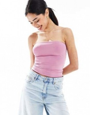 топ Топ Bershka без бретелек из полиамида светло-розового цвета (Bershka – Tr?gerloses Oberteil aus Polyamid in Hellrosa) Топ от Bershka * Простой дизайн * Фасон бандо * Облегающий крой Код товара: 14