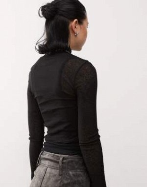 топ Топ Reclaimed Vintage с воротником-стойкой в рубчик и матовым узором, черный (Reclaimed Vintage – Geripptes, angerautes Oberteil in Schwarz mit Stehkragen) Топы Reclaimed Vintage * Ваш фаворит на 