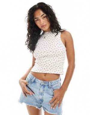 топ Майка-борцовка Miss Selfridge розового цвета с цветочным принтом (Miss Selfridge – Tr?gertop mit Ringerr?cken und rosa Bl?mchenmuster) Топ от Miss Selfridge * Цветочный узор * Круглый вырез * Без 