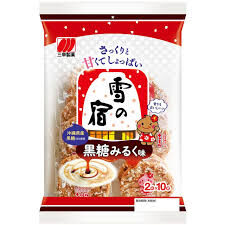 Закуска-Снэк Sanko Seika рисовый со вкусом молока и коричневого сахара 104 гр