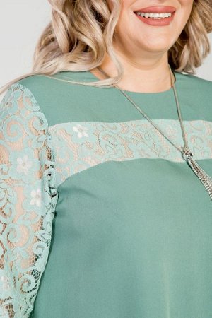 Платье Цвет:
светло-зеленый
Состав:
60%ПЭ 35%Вискоза 5%Эластан
Длина изделия:
105 см
Размер модели:
56
Рост модели:
174 см
Женственное комбинированное платье А-образного силуэта. Модель выполнена из к