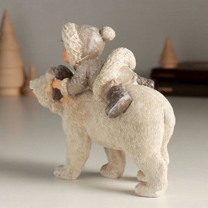 Фигурка полистоун «Ребёнок на белом мишке», 13.5x6x12.5 см