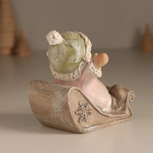 Фигурка полистоун «Малышка в санках, летит с горк», розовый, 9x7.8x9 см