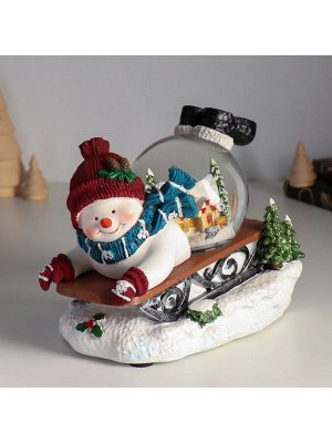 Снежный шар новогодний стеклянный «Снеговик на санках», музыкальный, световой, d=10 см, 22x14x17.5 см