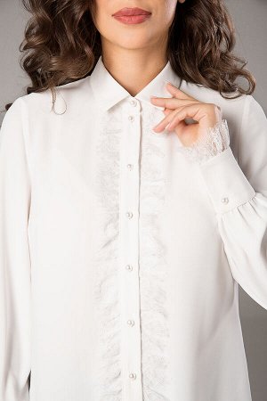 Рубашка Рубашка Teffi style 1472 
Состав ткани: ПЭ-100%; 
Рост: 170 см.

Рубашка женская прямого силуэта, с центральной застежкой на 8 петель и пуговиц. Перед разрезной, с нагрудными вытачками. Засте