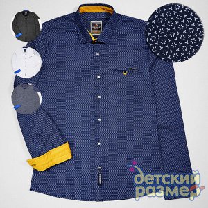Рубашка Рубашка для мальчиков - выполнена из качественного плотного текстиля- застегивается по всей длине на удобные пуговицы- украшена мелким лаконичным рисунком и контрастными деталями, на груди кар
