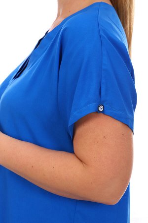 Блуза 6707 Цвет в ассортименте синий,василек Ткань: штапель; Состав: 20% хлопок, 80% полиэстер; Характеристики: Длина изделия (см)- 48 - 75, 50 - 75, 52 - 75, 54 - 75, 56 - 78, 58 - 78, 60 - 78, 62 - 