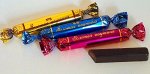 Конфеты в форме палочек в фирменной темной глазури с темной начинкой