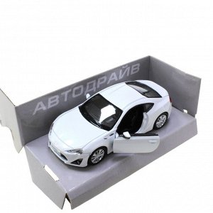 Модель машины Toyota 86 масштаб 1:32 (длинна 12см)  белого цвета.