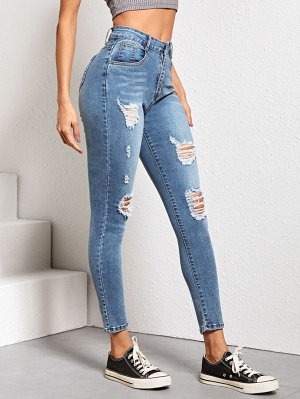 Облегающие рваные джинсы с карманом