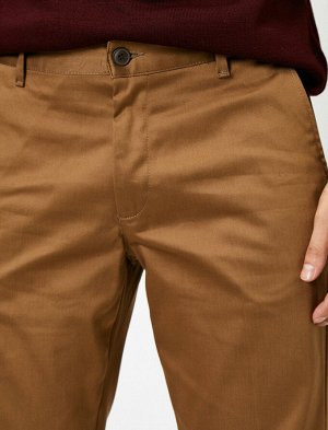 брюки Материал: %97 Хлопок, %3 Эластан Параметры модели: рост: 189 cm, грудь: 99, талия: 75, бедра: 99 Надет размер: 42