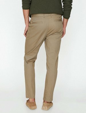 брюки Материал: %100 Хлопок Параметры модели:  рост: 187 cm, грудь: 98, талия: 74, бедра: 94 Надет размер: 42
