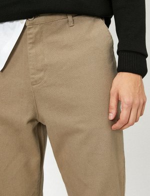 брюки Материал: %100 Хлопок Параметры модели: рост: 189 cm, грудь: 99, талия: 75, бедра: 99 Надет размер: 42