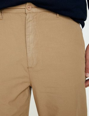 брюки Материал: %100 Хлопок Параметры модели:  рост: 186 cm, грудь: 97, талия: 82, бедра: 92 Надет размер: 42