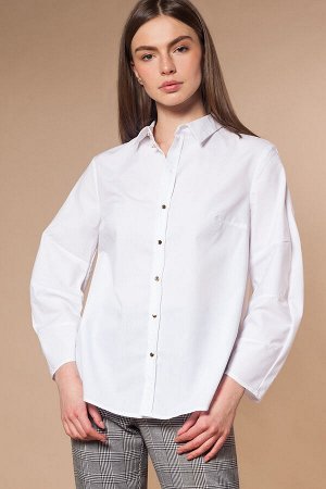 Блузка из эластичного хлопка с дизайнерским кроем рукава.