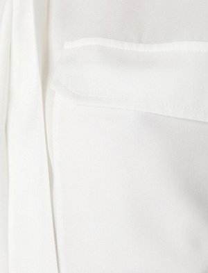 рубашки Материал %100 полиэстер Параметры модели: рост: 177 cm, грудь: 83, талия: 61, бедра: 91 Надет размер: 36