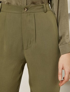 брюки Материал %100 Tensel Параметры модели: рост: 178 cm, грудь: 82, талия: 60, бедра: 90 Надет размер: 36