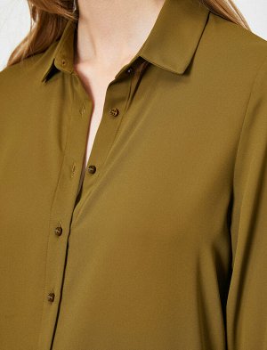 рубашки Материал %100 полиэстер Параметры модели: рост: 177 cm, грудь: 85, талия: 59, бедра: 88 Надет размер: 36