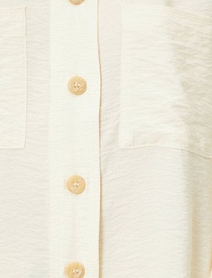 рубашки Материал %86 Вискоз, %14 полиамид Параметры модели: рост: 173 cm, грудь: 80, талия: 58, бедра: 88 Надет размер: 36